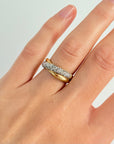 Bague double jonc entrelacés en or jaune et diamants