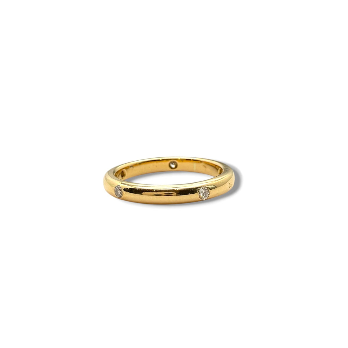 Alliance en or jaune 18 carats sertie de cinq diamants taille brillant