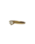 Bague solitaire en or jaune 18 carats ornée d'un diamant de 0,2 carats. 