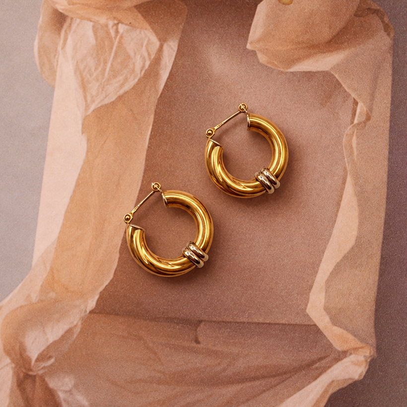 Créoles torsadées bicolores en or jaune et or blanc 18 carats, années 1990
