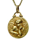 Médaille en or jaune figurant un angelot, médaille ancienne des années 1900-1910. Très bel état. 