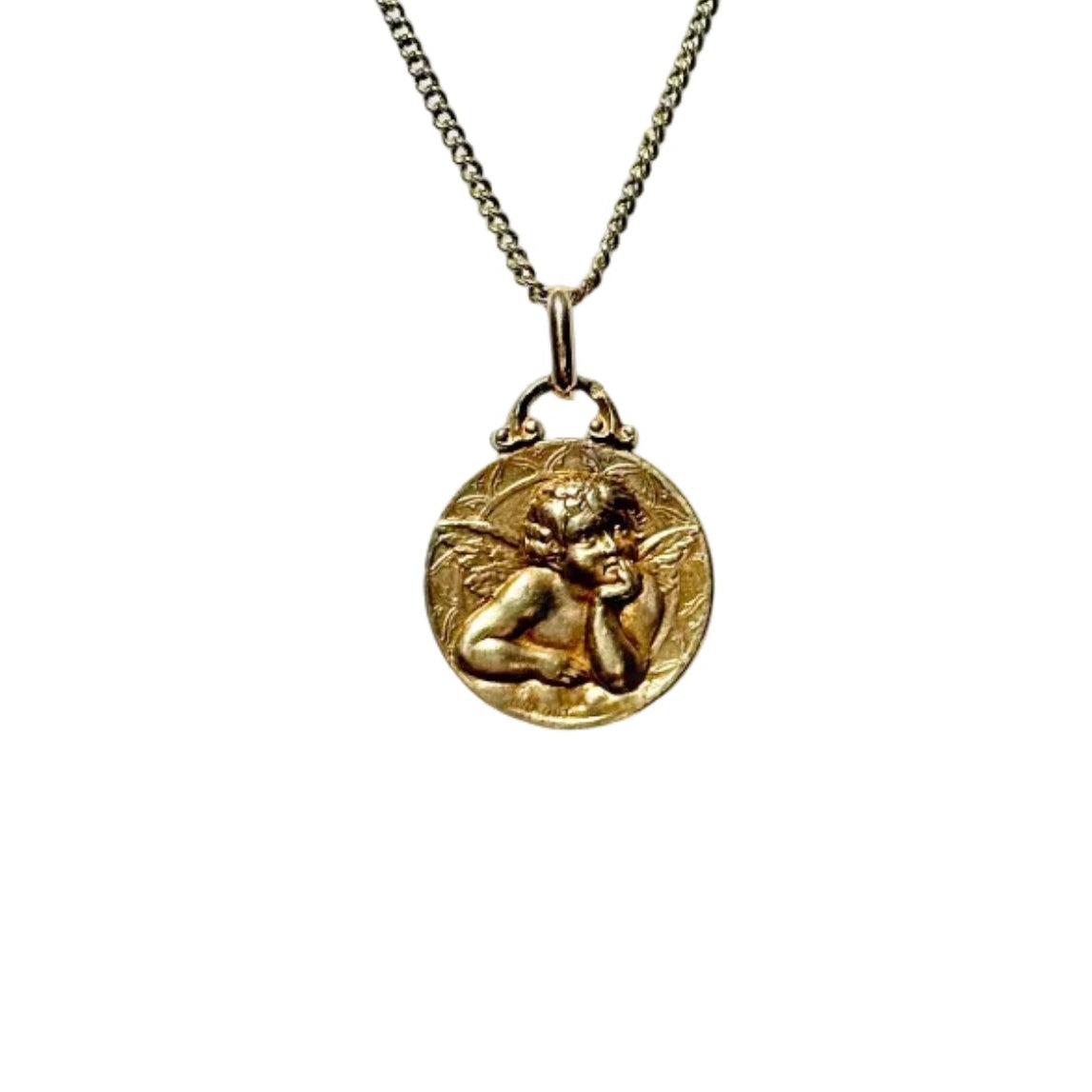 médaille art nouveau en or jaune 18 carats ornée d'un ange rêveur