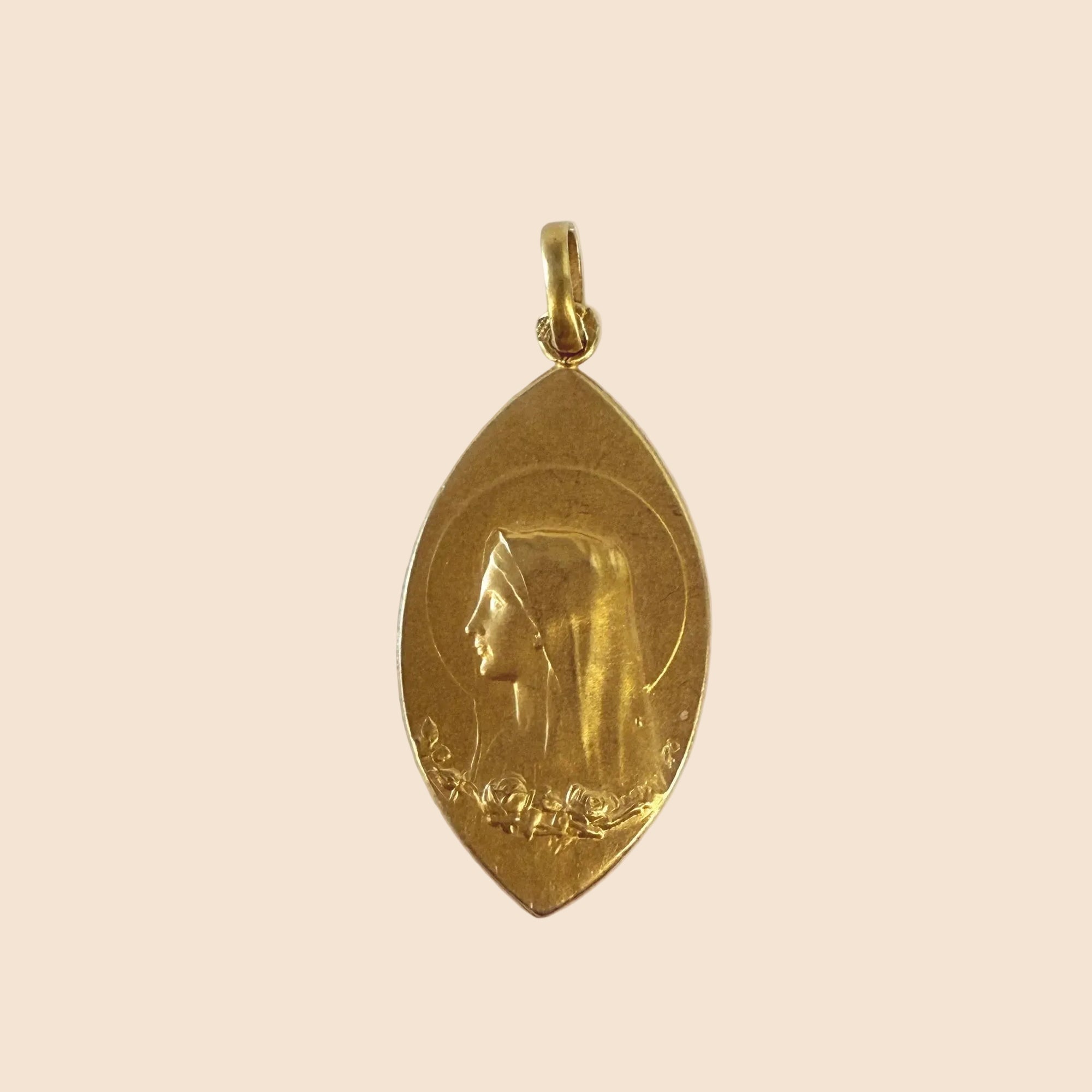 Médaille de baptême losange figurant une vierge, ancienne. 