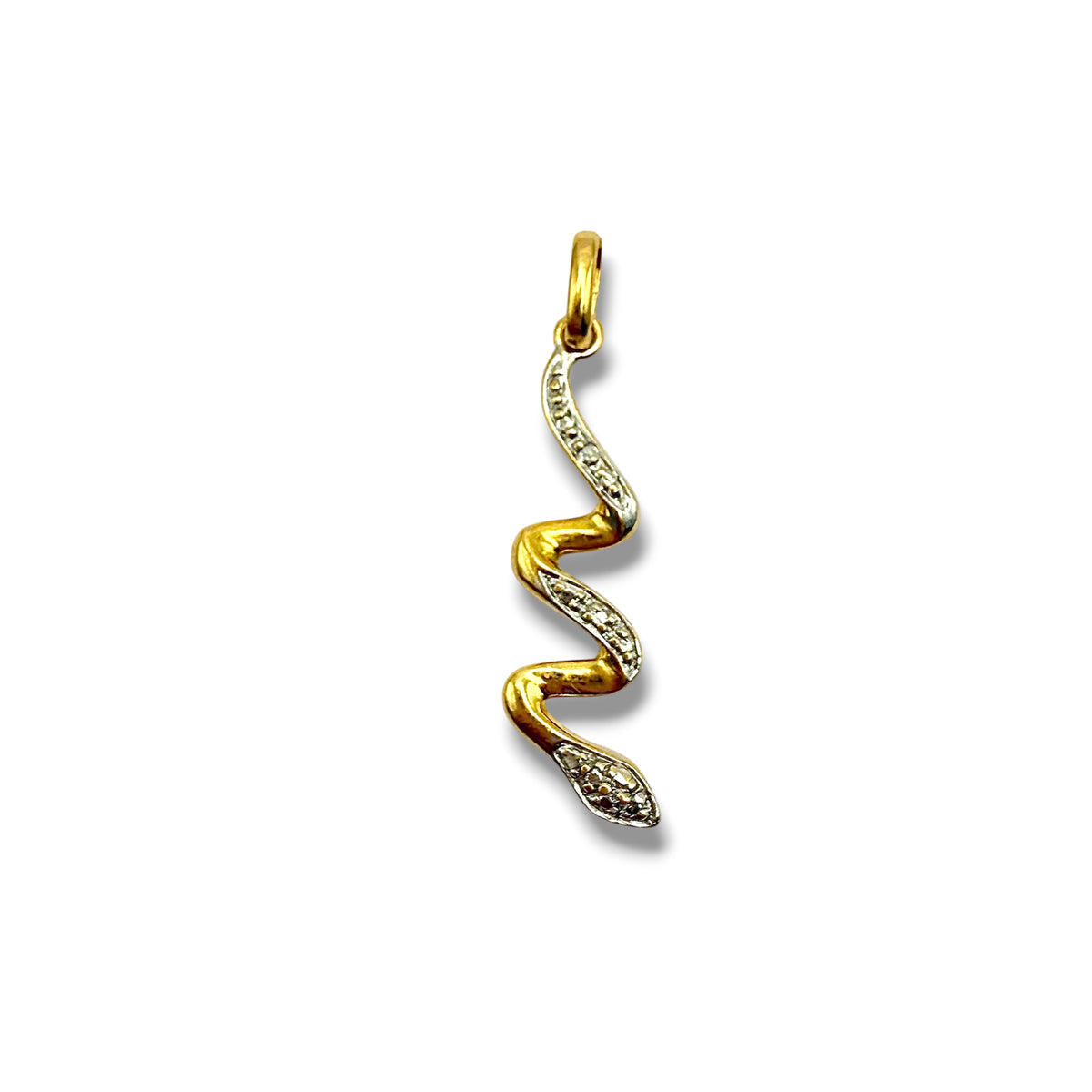 Pendentif en or jaune 18 carats et or blanc orné d'un travail brillanté et diamant. 