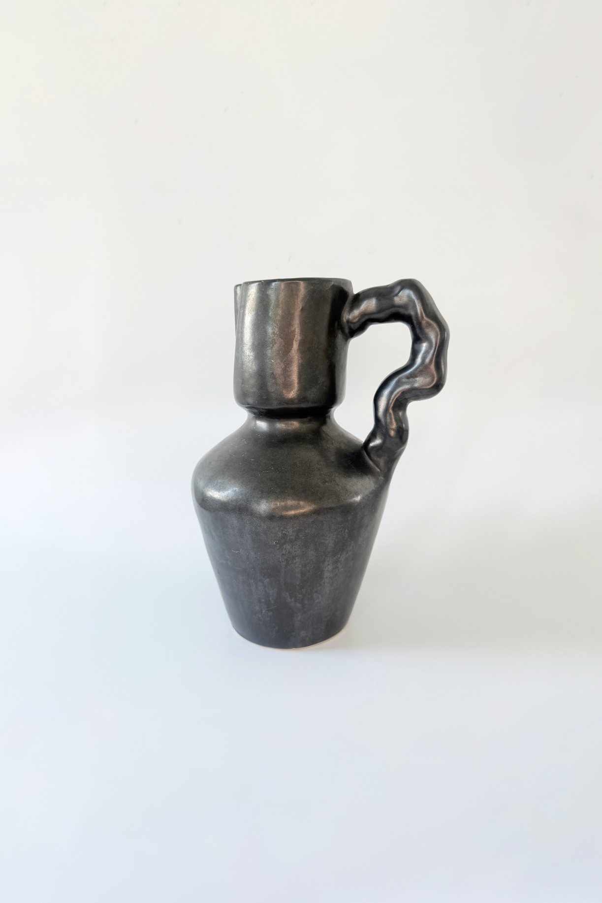 Vase vintage en céramique noire style Jouve, années 80